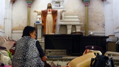 Eine irakische Christin ist aus Mosul in eine Kirche nach Telkaif geflohen (Archiv).